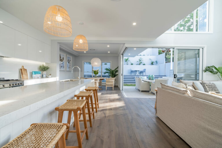 “Quality timber floors like this make an all-white home interior warm and inviting.”