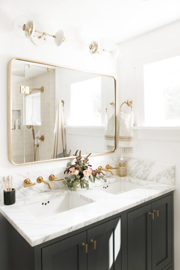 small bathroom with large mirror