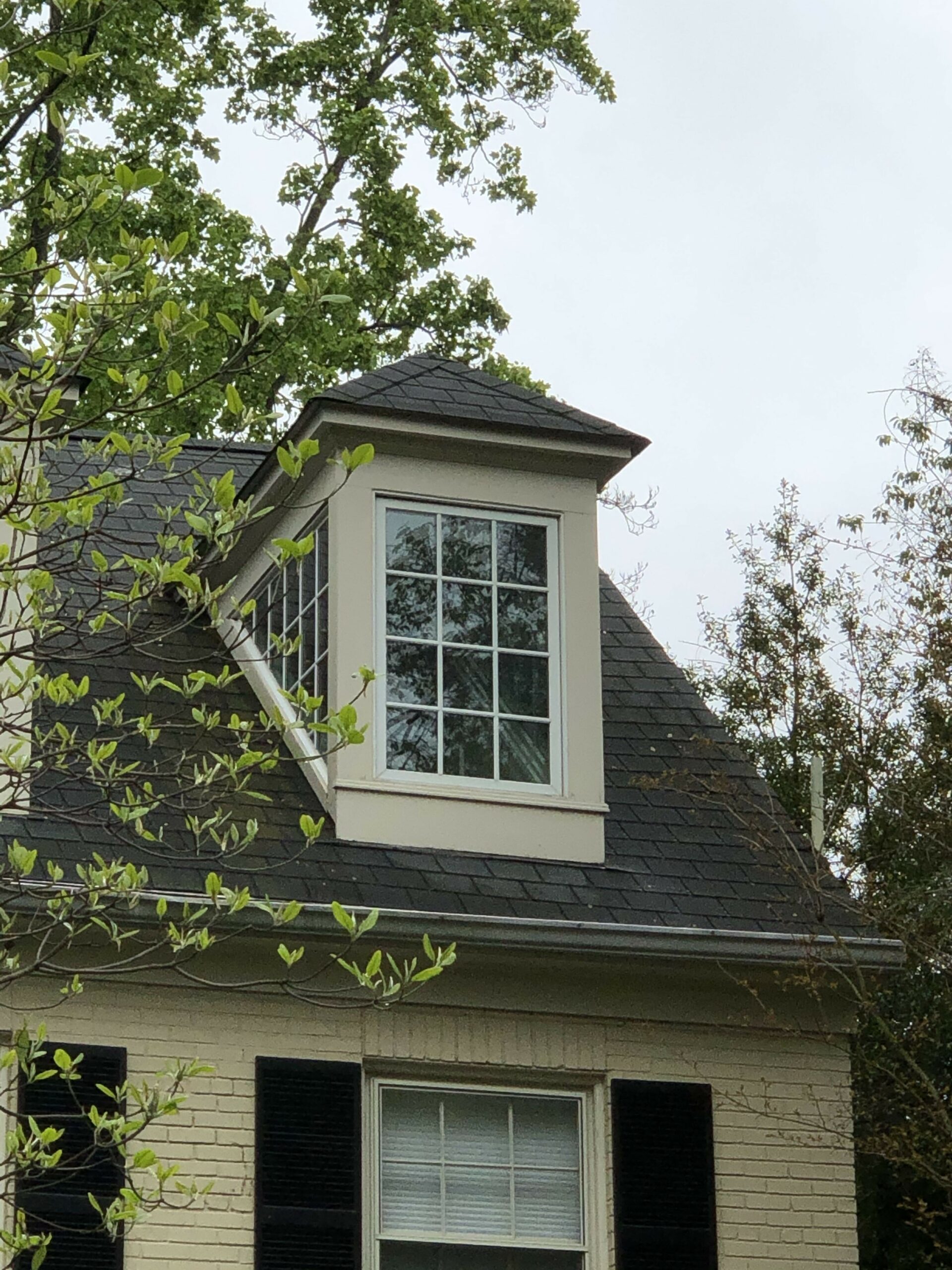 vintage home with dormer window