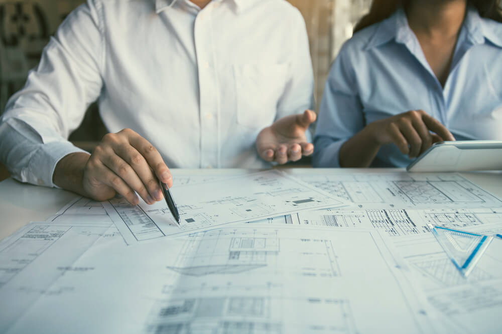 building designer explaining home plans