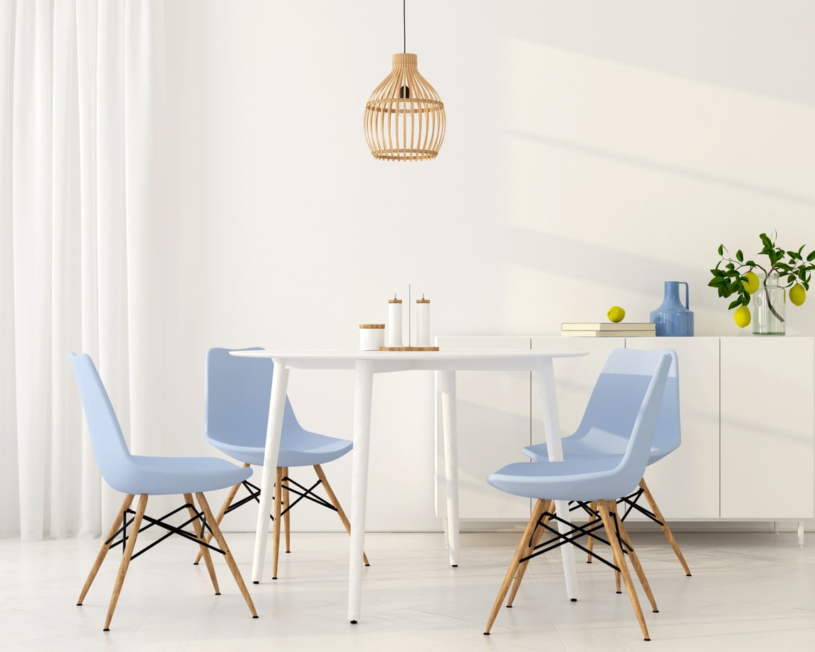 pale blue dining room with pendant light