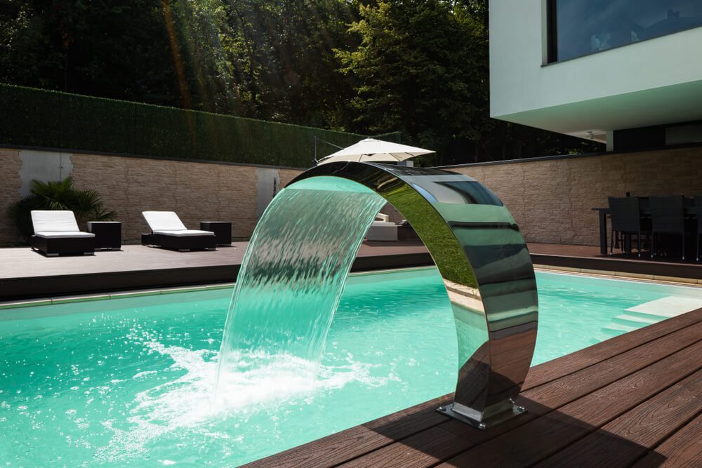 sleek water fountain in pool