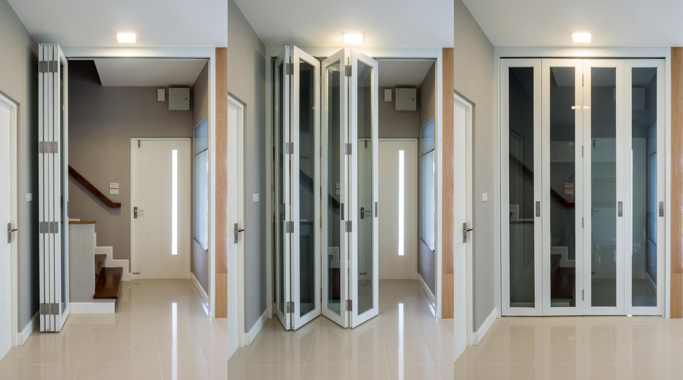 three frames of white bifold doors