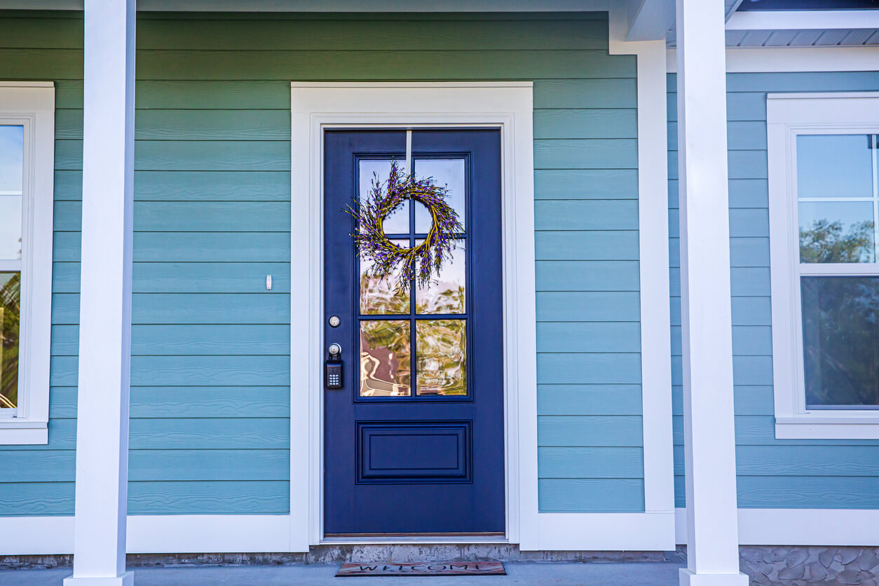 blue door with blue cladding