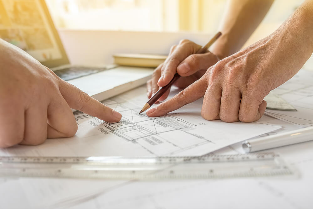 building designer making house plans