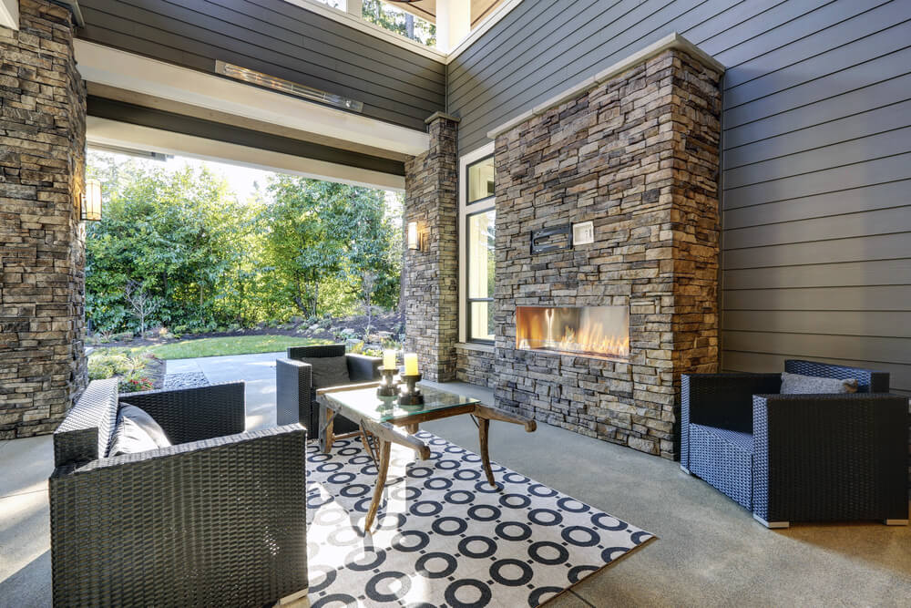 alfresco renovations with bricked fireplace
